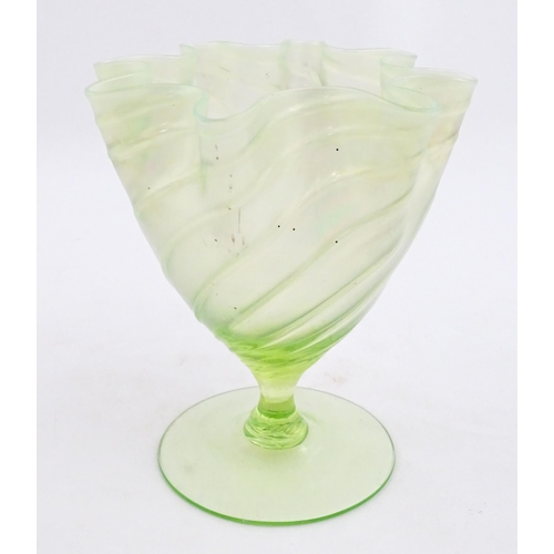 280 - A uranium glass pedestal vase with flared rim in the manner of John Walsh Walsh. Approx. 6