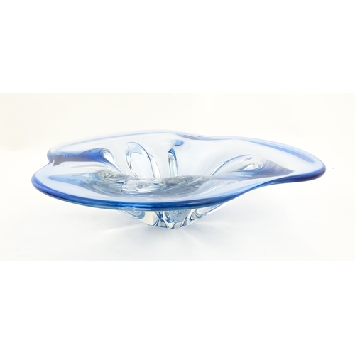 284 - A blue art glass freeform centrepiece bowl. Approx. 13 1/2