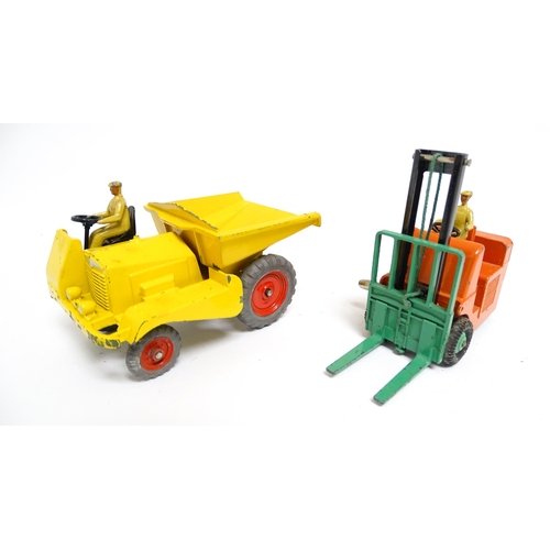 1166 - Toys: Three Dinky Supertoys die cast scale model vehicles comprising Dumper Truck model no. 562, Ley... 