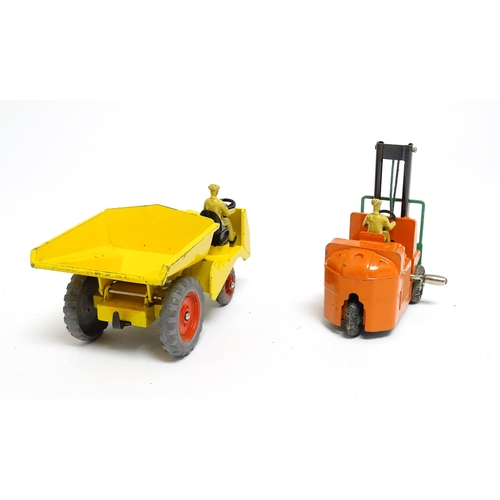 1166 - Toys: Three Dinky Supertoys die cast scale model vehicles comprising Dumper Truck model no. 562, Ley... 