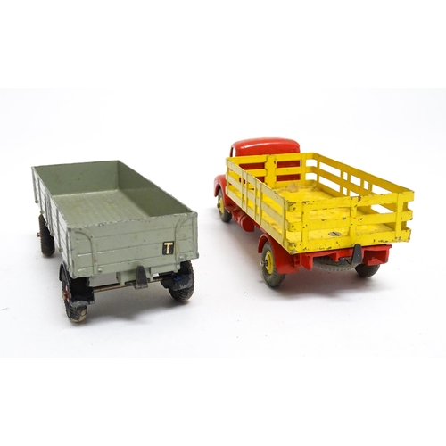 1166 - Toys: Three Dinky Supertoys die cast scale model vehicles comprising Dumper Truck model no. 562, Ley... 