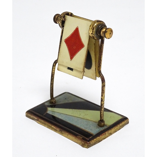 1168 - An Art Deco gilt metal trump card / suit indicator marker. Approx. 3