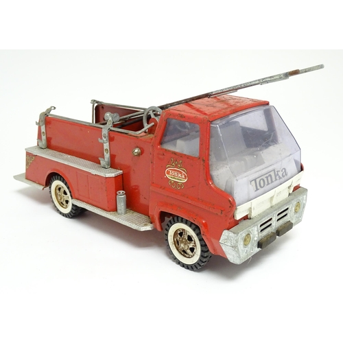 1169 - Toy: A 20thC Tonka Toys metal pumper fire engine / truck. Approx. 15 1/4