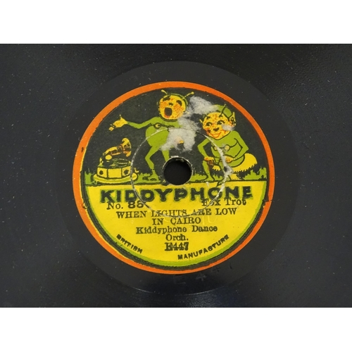 1174 - Toy: A 20thC German Bing tinplate clockwork Bingola 1 phonograph, together with assorted records. Ap... 