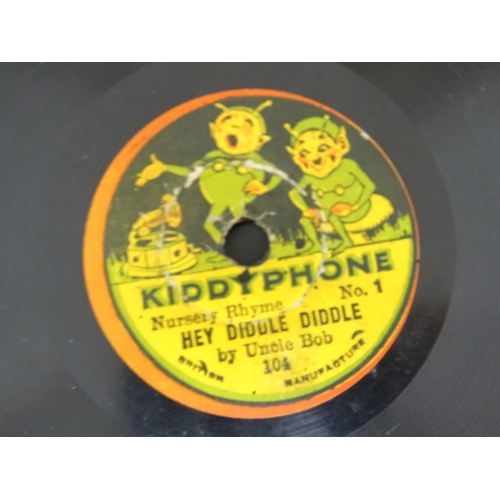 1174 - Toy: A 20thC German Bing tinplate clockwork Bingola 1 phonograph, together with assorted records. Ap... 