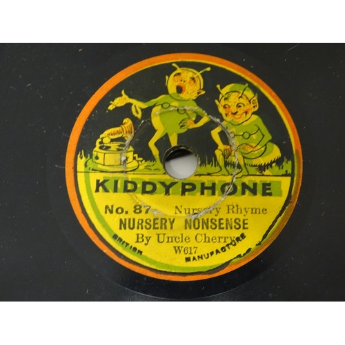 1174 - Toy: A 20thC German Bing tinplate clockwork Bingola 1 phonograph, together with assorted records. Ap... 