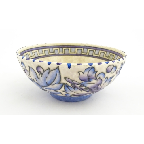 147 - A Bursley Ware bowl decorated by Charlotte Rhead in the Wind Tossed Peony pattern. Marked under. App... 