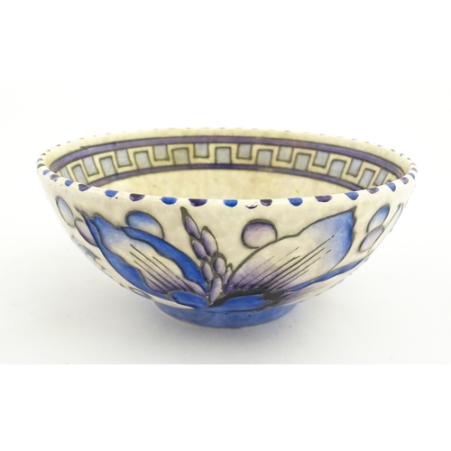 147 - A Bursley Ware bowl decorated by Charlotte Rhead in the Wind Tossed Peony pattern. Marked under. App... 