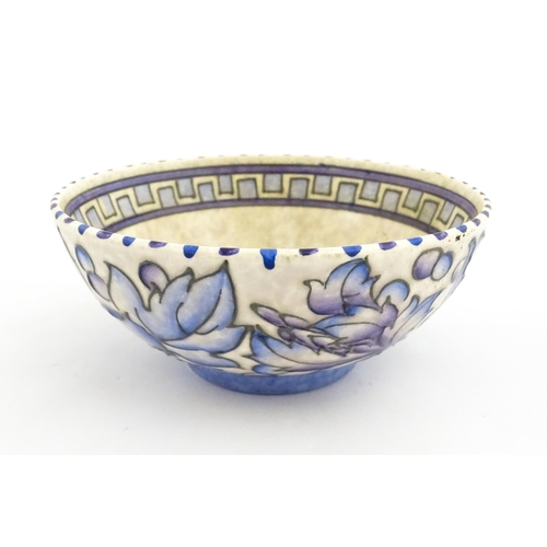 147 - A Bursley Ware bowl decorated by Charlotte Rhead in the Wind Tossed Peony pattern. Marked under. App... 