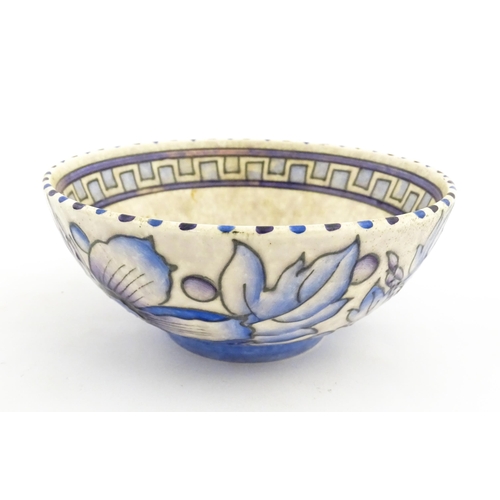 147 - A Bursley Ware bowl decorated by Charlotte Rhead in the Wind Tossed Peony pattern. Marked under. App... 