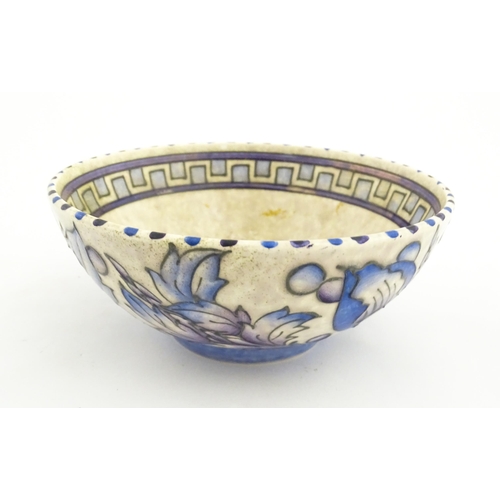 147 - A Bursley Ware bowl decorated by Charlotte Rhead in the Wind Tossed Peony pattern. Marked under. App... 