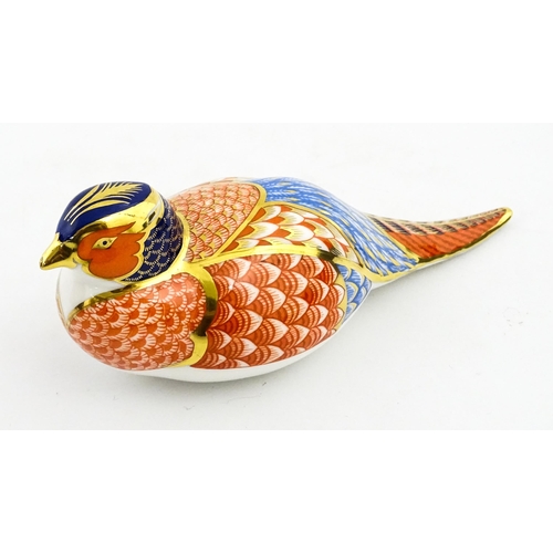 148 - A Royal Crown Derby paperweight modelled as a pheasant. Marked under, with gold stopper. Boxed. Appr... 