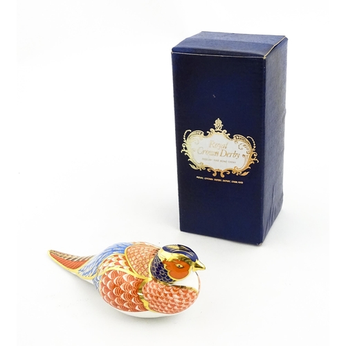 148 - A Royal Crown Derby paperweight modelled as a pheasant. Marked under, with gold stopper. Boxed. Appr... 