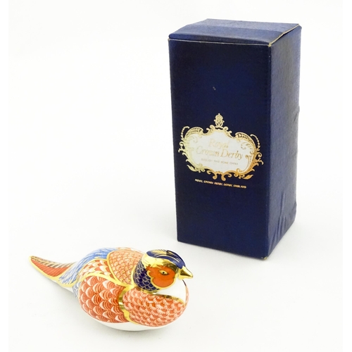 148 - A Royal Crown Derby paperweight modelled as a pheasant. Marked under, with gold stopper. Boxed. Appr... 