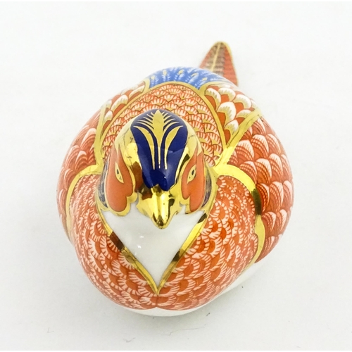 148 - A Royal Crown Derby paperweight modelled as a pheasant. Marked under, with gold stopper. Boxed. Appr... 