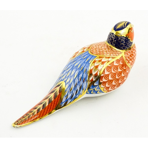 148 - A Royal Crown Derby paperweight modelled as a pheasant. Marked under, with gold stopper. Boxed. Appr... 