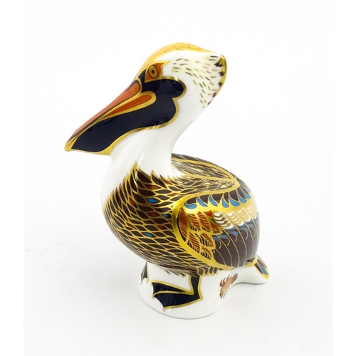 149 - A Royal Crown Derby limited edition Hadleigh paperweight modelled as a Brown Pelican, designed by Jo... 