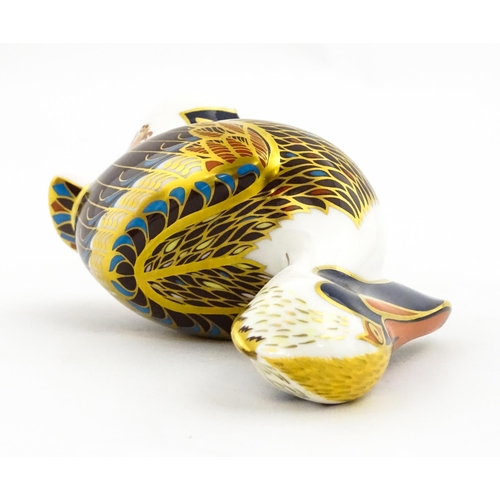 149 - A Royal Crown Derby limited edition Hadleigh paperweight modelled as a Brown Pelican, designed by Jo... 