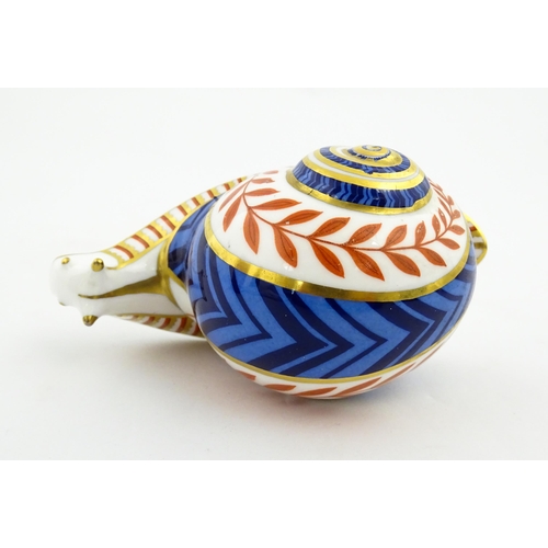 152 - A Royal Crown Derby paperweight modelled as a snail. Marked under, with gold stopper. Approx. 5