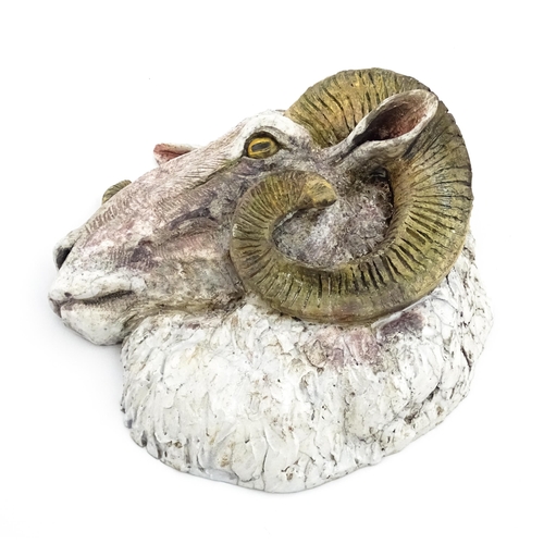 176 - A Sallie Wakley (b. 1967) studio pottery wall hanging plaque modelled as the head of a ram. Signed a... 