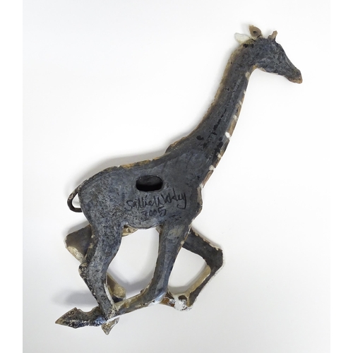 177 - A Sallie Wakley (b. 1967) studio pottery wall hanging plaque modelled as a water buffalo. Together w... 