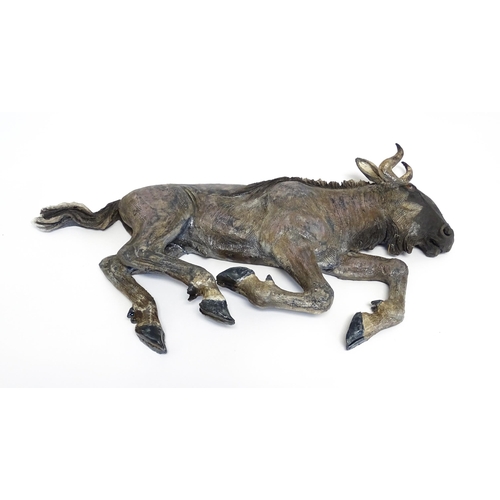 177 - A Sallie Wakley (b. 1967) studio pottery wall hanging plaque modelled as a water buffalo. Together w... 