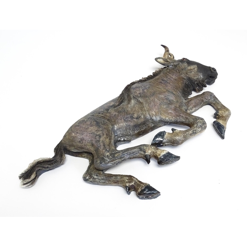 177 - A Sallie Wakley (b. 1967) studio pottery wall hanging plaque modelled as a water buffalo. Together w... 