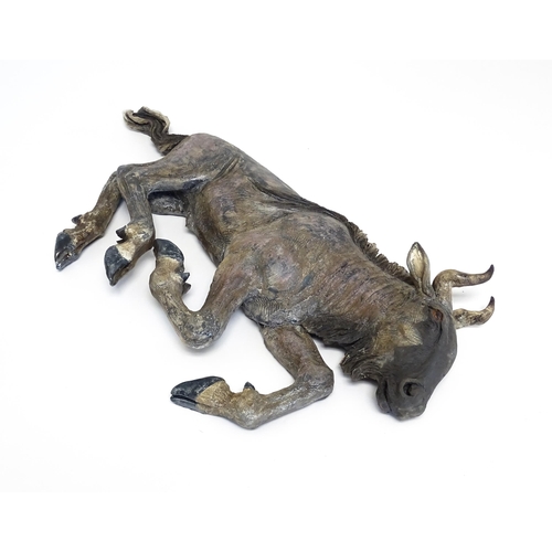 177 - A Sallie Wakley (b. 1967) studio pottery wall hanging plaque modelled as a water buffalo. Together w... 