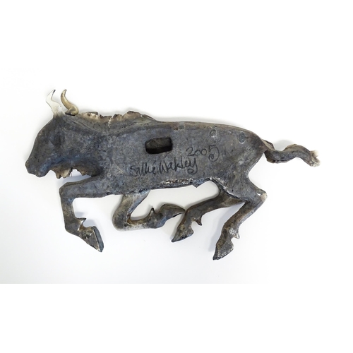 177 - A Sallie Wakley (b. 1967) studio pottery wall hanging plaque modelled as a water buffalo. Together w... 