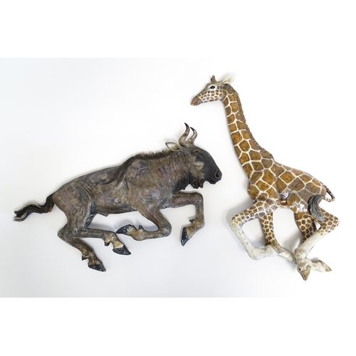 177 - A Sallie Wakley (b. 1967) studio pottery wall hanging plaque modelled as a water buffalo. Together w... 