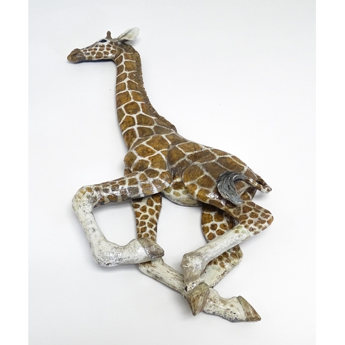 177 - A Sallie Wakley (b. 1967) studio pottery wall hanging plaque modelled as a water buffalo. Together w... 