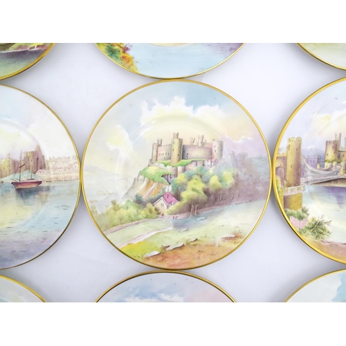 202 - A set of twelve Minton plates depicting castles of the United Kingdom to include Stirling Castle, Ed... 