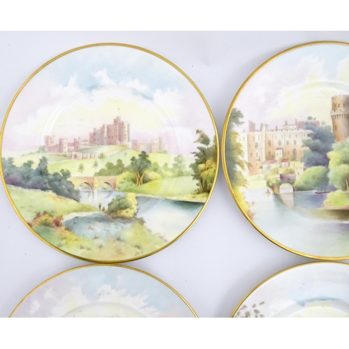 202 - A set of twelve Minton plates depicting castles of the United Kingdom to include Stirling Castle, Ed... 