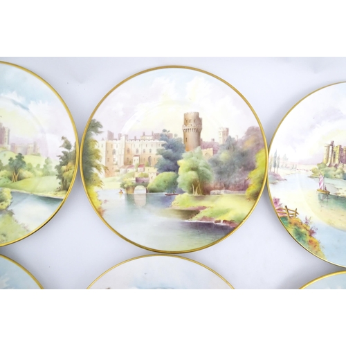 202 - A set of twelve Minton plates depicting castles of the United Kingdom to include Stirling Castle, Ed... 