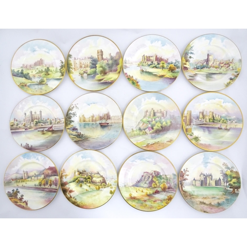 202 - A set of twelve Minton plates depicting castles of the United Kingdom to include Stirling Castle, Ed... 