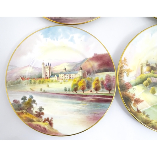 202 - A set of twelve Minton plates depicting castles of the United Kingdom to include Stirling Castle, Ed... 