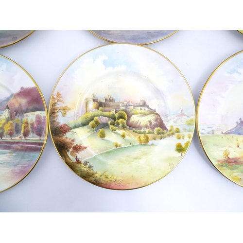 202 - A set of twelve Minton plates depicting castles of the United Kingdom to include Stirling Castle, Ed... 