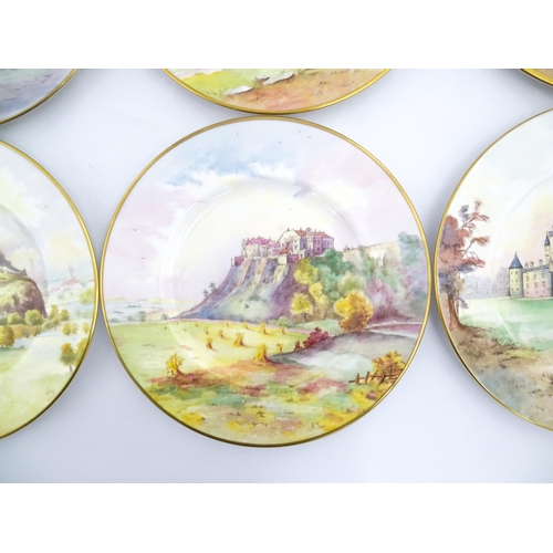 202 - A set of twelve Minton plates depicting castles of the United Kingdom to include Stirling Castle, Ed... 