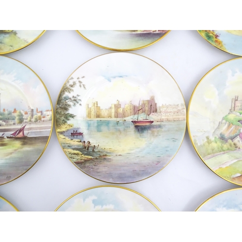 202 - A set of twelve Minton plates depicting castles of the United Kingdom to include Stirling Castle, Ed... 