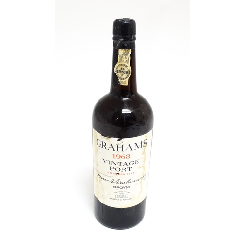 1145 - A bottle of Grahams 1963 vintage port (approx 75cl)