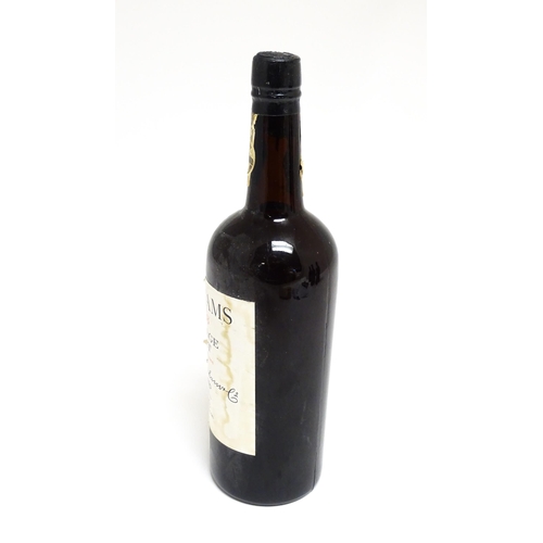 1145 - A bottle of Grahams 1963 vintage port (approx 75cl)