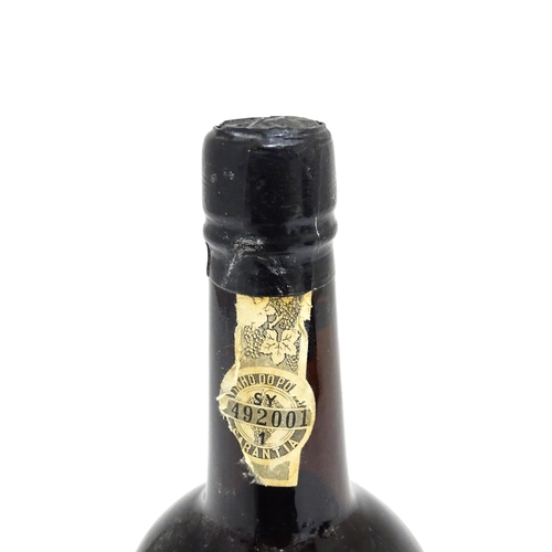 1145 - A bottle of Grahams 1963 vintage port (approx 75cl)