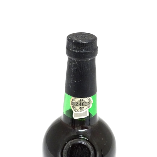 1147 - A 70cl bottle of 1983 Taylor's late bottled vintage port.