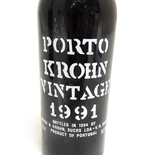 1148 - Two bottles of port, comprising a Croft vintage 1970 (approx 75cl) and a 37.5cl bottle of Porto Kroh... 