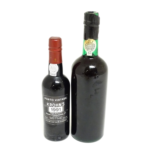 1148 - Two bottles of port, comprising a Croft vintage 1970 (approx 75cl) and a 37.5cl bottle of Porto Kroh... 