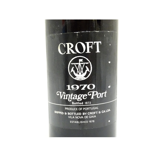 1148 - Two bottles of port, comprising a Croft vintage 1970 (approx 75cl) and a 37.5cl bottle of Porto Kroh... 