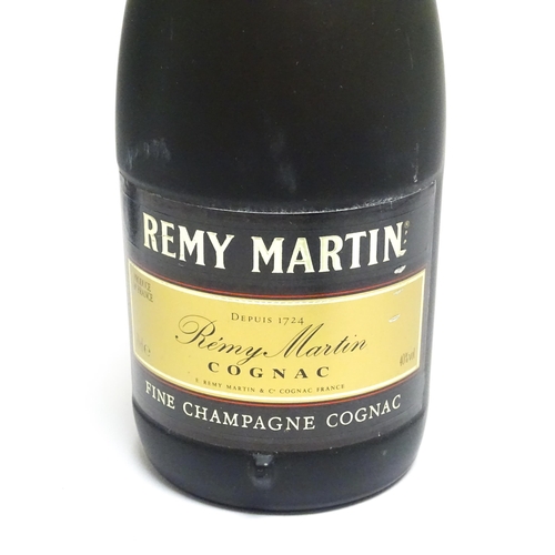 1149 - Three 70cl bottles of Remy Martin cognac brandy, together with a 70cl bottle of Remy Martin VSOP cog... 