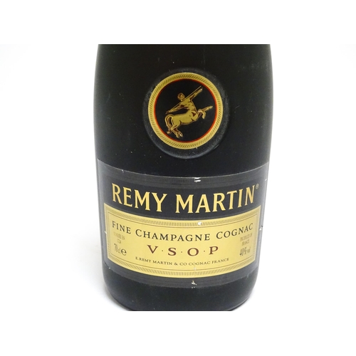 1149 - Three 70cl bottles of Remy Martin cognac brandy, together with a 70cl bottle of Remy Martin VSOP cog... 