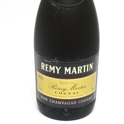 1149 - Three 70cl bottles of Remy Martin cognac brandy, together with a 70cl bottle of Remy Martin VSOP cog... 