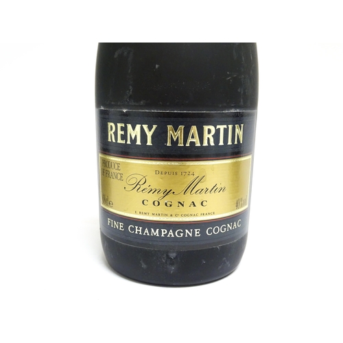 1149 - Three 70cl bottles of Remy Martin cognac brandy, together with a 70cl bottle of Remy Martin VSOP cog... 